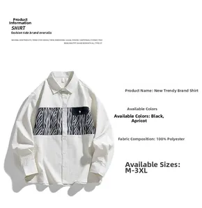 Detail of waffle textured fabric and zebra pattern pocket on this men's long sleeve shirt