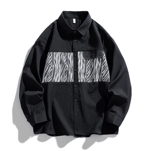 Men's black waffle texture shirt with contrast abstract zebra pattern and chest pocket