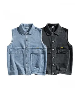 Detailed view of vintage washed denim vests in light blue and charcoal grey colors