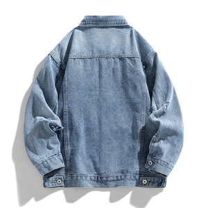 Men's light blue vintage denim jacket with distressed details and back seam view