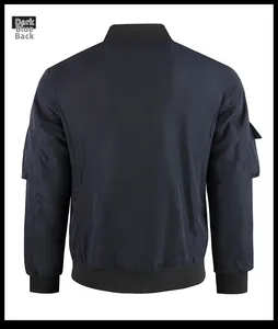 Rear view of dark blue flight bomber jacket featuring ribbed trim and utility arm pocket
