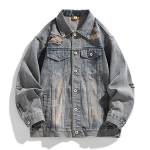 Vintage light blue wash denim jacket with distressed details and chest pockets for men