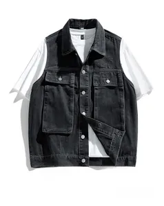 Detail view of retro black washed denim vest with functional multi-pocket design on white tee