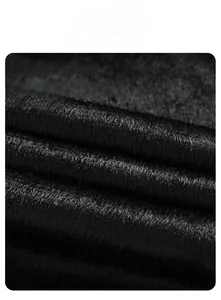 Close-up of thick black fleece lining material for cold weather thermal jackets