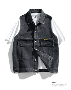Detailed flat lay of a vintage washed dark grey denim vest with functional utility pockets