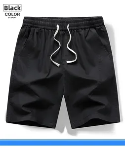 Détail du short de sport noir pour hommes avec taille élastique et cordon de serrage blanc