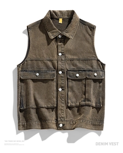 Detail of vintage grey denim vest showing metal buttons and front flap pockets