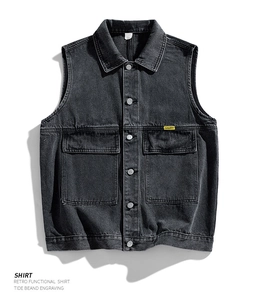Close-up of retro functional denim vest featuring metal buttons and large flap pockets