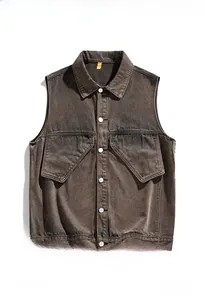 Detail of vintage washed brown denim vest featuring rugged metal buttons and cargo pockets