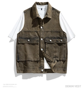 Detail view of retro washed brown denim vest featuring four utility cargo pockets and metal buttons