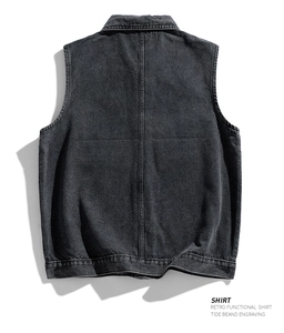 Rear view of vintage dark grey denim vest showing washed texture and seam details