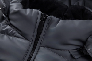Detail shot of men's hooded jacket featuring windproof matte fabric and warm fleece lining