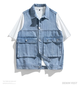 Detail view of light blue denim vest featuring utility pockets and metallic buttons