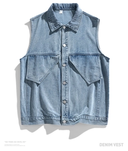 Detail of light blue washed denim vest showing metal buttons and flap pockets