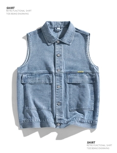 Detail view of denim vest showing large flap pockets and classic metal buttons