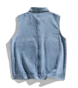 Detail view of the back of a vintage light blue washed denim vest for men with stitching