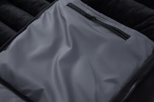 Detail of the inner gray zipper pocket and soft black fleece lining of the men jacket