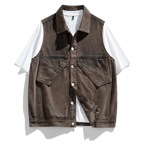 Front view of a brown washed denim vest with large pockets and metal buttons