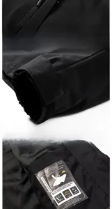 Détails de la veste imperméable: fermeture éclair, poignets réglables et doublure mesh