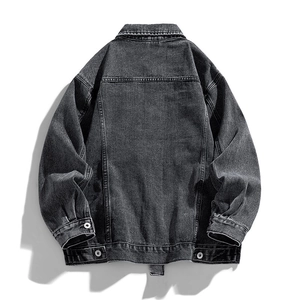 Men's vintage washed grey denim jacket shown from back view with button hem details