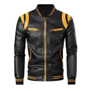 Detail of faux leather texture and yellow striped ribbed cuffs on motorcycle jacket