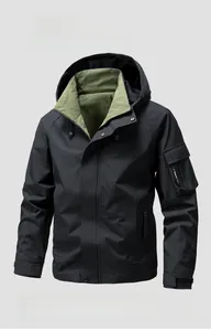 Detail of waterproof jacket showing sleeve zipper pocket and olive green lining inside