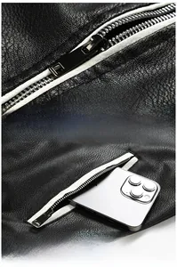 Close-up of premium black leather jacket showing metal zipper and side pocket texture