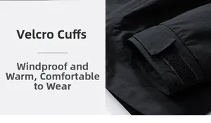 Détail du poignet réglable avec velcro sur une veste coupe-vent noire pour hommes