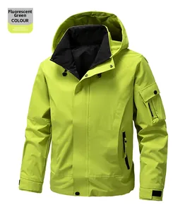 Detail of neon green waterproof jacket featuring arm zipper pocket and velcro cuffs