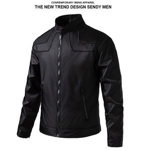 Detail of shoulder geometric stitching and zipper pocket on black men's jacket