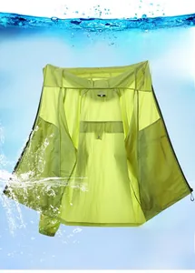 Detailed view of light green sun protection jacket with waterproof quick-dry fabric