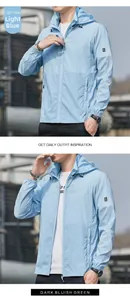 Detail of light blue sun protection jacket with adjustable hood and zipper closure