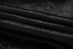 Close-up of thick black faux leather lining with soft high-density coral fleece texture