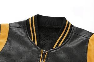 Detail of the stand collar and soft fleece lining of this black and yellow leather jacket