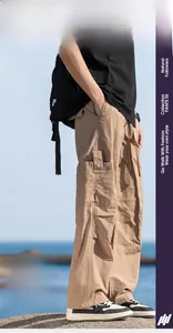 Detail of khaki techwear outdoor pants with water-repellent and quick-dry fabric feature