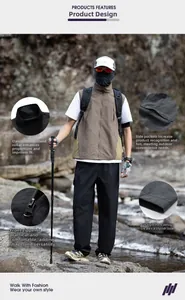 Detail view of khaki multi-pocket hiking vest with zippered collar and durable utility fabric