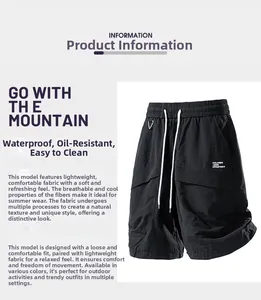 Detail of waterproof cargo shorts with elastic waist, drawstrings, and utility pocket