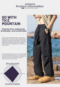 Detail showing waterproof and breathable technical features of black outdoor cargo pants