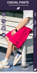 Dettaglio dei pantaloncini sportivi rosso rosa che mostra il tessuto traspirante ad asciugatura