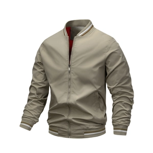 Men's khaki baseball jacket with striped ribbing and red lining on white background