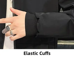 Close-up of elastic ribbed cuffs on a black men's casual jacket with windproof fabric