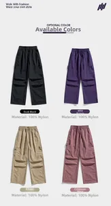 Detail view of four-color nylon cargo pants featuring elastic drawstrings and side pockets