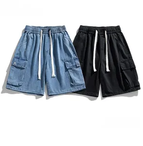 Detail of cargo denim shorts featuring elastic waist, white drawstrings and large side pockets