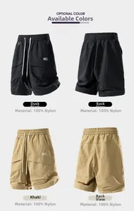 Detail view of water-resistant nylon cargo shorts with elastic waist and multi-pockets