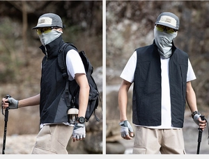 Outdoor technical black vest detail with high collar and multi-pocket functional design