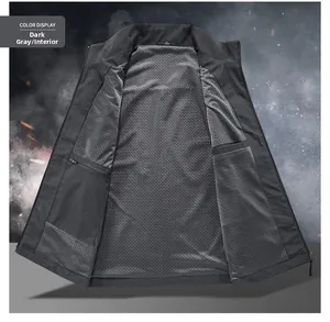 Detail view of breathable mesh lining and secure inner zipper pocket on dark grey vest