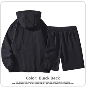 Rear view of black lightweight hooded sports jacket and shorts set with elastic cuffs