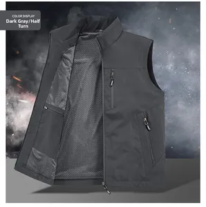 Detail of dark grey utility vest with mesh lining and multiple functional zippers
