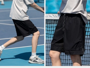 Dettagli di pantaloncini sportivi neri da uomo con vita elastica e tessuto tecnico