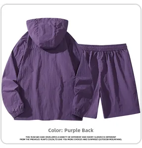 Flat lay of purple breathable outdoor windbreaker jacket and matching elastic shorts
